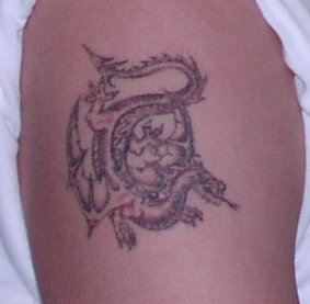 maliks-dragon-tattoo.jpg